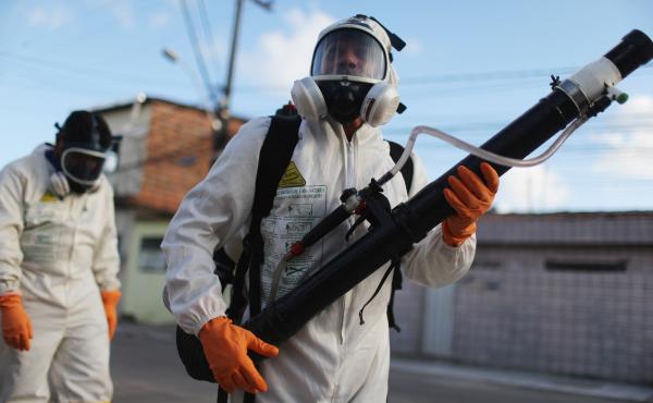 Health workers fumigate to wipe out mosquitoes in Recife, Brazil. Health workers fumigate to wipe out mosquitoes in Recife, Brazil.