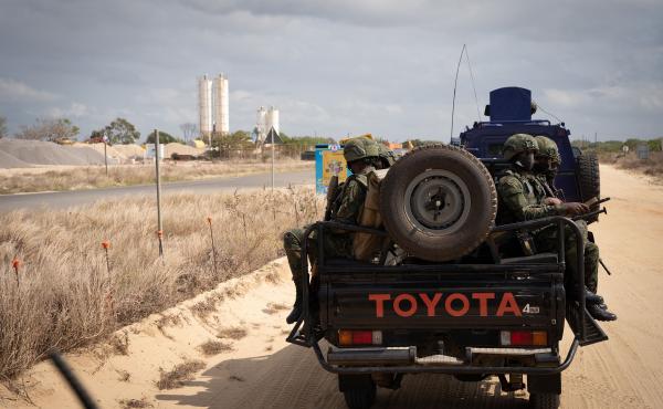 Soldiers patrol near the TotalEnergies complex in Cabo Delgado, Mozambique. Last year the insurgency caused TotalEnergies to put onshore operations on hold. But Italy's ENI and ExxonMobil are moving ahead with a new floating LNG ship offshore. It plans to Soldiers patrol near the TotalEnergies complex in Cabo Delgado, Mozambique. Last year the insurgency caused TotalEnergies to put onshore operations on hold. But Italy's ENI and ExxonMobil are moving ahead with a new floating LNG ship offshore. It plans to