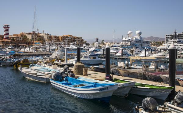 Many Americans are visiting Mexico's beaches during the pandemic. Above, fishing boats are docked at a marina in Los Cabos, Mexico, on June 2. Many Americans are visiting Mexico's beaches during the pandemic. Above, fishing boats are docked at a marina in Los Cabos, Mexico, on June 2.