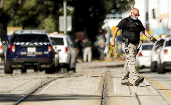 Law enforcement officers respond to a mass shooting at a Santa Clara Valley Transportation Authority facility on Wednesday in San Jose, Calif. A Santa Clara County sheriff's spokesman said the rail yard shooting left multiple people, including the shooter Law enforcement officers respond to a mass shooting at a Santa Clara Valley Transportation Authority facility on Wednesday in San Jose, Calif. A Santa Clara County sheriff's spokesman said the rail yard shooting left multiple people, including the shooter