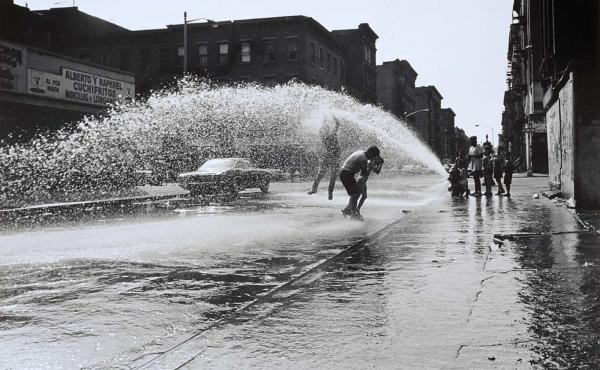 "Hydrant: In the Air," 1963 — "It's significant because it shows us. We were not allowed to go to the public pools. So we opened our hydrant and we cooled ourselves off. But when I saw it and photographed it I made it more than just poor people turning "Hydrant: In the Air," 1963 — "It's significant because it shows us. We were not allowed to go to the public pools. So we opened our hydrant and we cooled ourselves off. But when I saw it and photographed it I made it more than just poor people turning