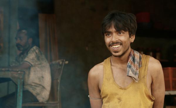 He is "the white tiger" — a poor villager, Balram, portrayed by actor Adarsh Gourav, who is determined to use his intelligence to escape a life of poverty. He is "the white tiger" — a poor villager, Balram, portrayed by actor Adarsh Gourav, who is determined to use his intelligence to escape a life of poverty.