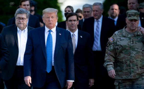 President Trump walks from the White House to visit St. John's Church after the area was cleared of people protesting the death of George Floyd. President Trump walks from the White House to visit St. John's Church after the area was cleared of people protesting the death of George Floyd.