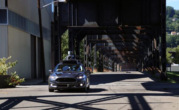 A self-driving car leaves Uber's newest riverside hub in Pittsburgh. Company officials say the Rust Belt city is perfect for beta testing, citing diverse topography, frequent weather maladies, near-constant construction and hundreds of bridges and tunnels A self-driving car leaves Uber's newest riverside hub in Pittsburgh. Company officials say the Rust Belt city is perfect for beta testing, citing diverse topography, frequent weather maladies, near-constant construction and hundreds of bridges and tunnels