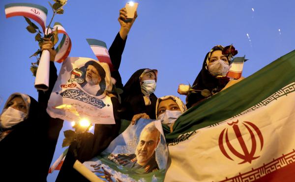 Supporters of Iranian President-elect Ebrahim Raisi celebrate in Tehran on Saturday after he won the presidential election. Supporters of Iranian President-elect Ebrahim Raisi celebrate in Tehran on Saturday after he won the presidential election.