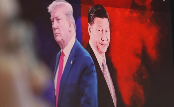 A computer screen in Seoul shows images of Chinese President Xi Jinping and President Trump in 2019. A computer screen in Seoul shows images of Chinese President Xi Jinping and President Trump in 2019.