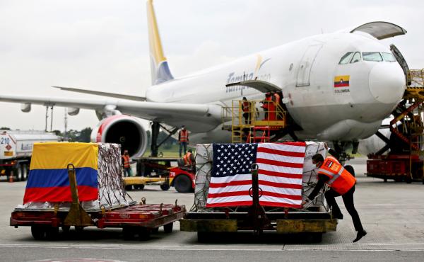 Containers of Moderna COVID-19 vaccine doses, donated by the United States, arrive in Bogota, Colombia, in July. The U.S. plans to send more than a billion vaccines abroad by September 2022. Containers of Moderna COVID-19 vaccine doses, donated by the United States, arrive in Bogota, Colombia, in July. The U.S. plans to send more than a billion vaccines abroad by September 2022.