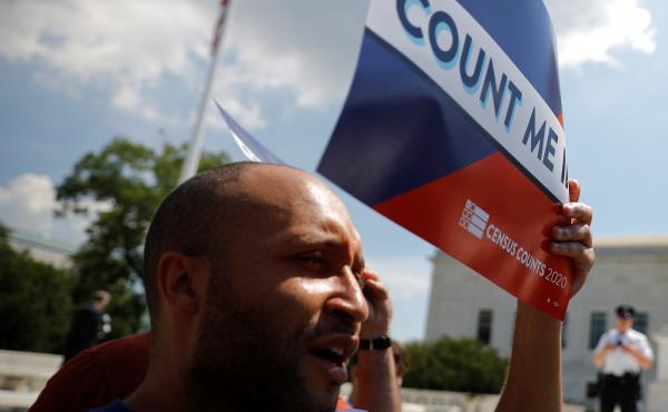 Demonstrators hold signs saying "Count Me In" outside the U.S. Supreme Court in Washington, D.C., in 2019, when the court blocked former President Donald Trump's administration from adding a citizenship question to 2020 census forms. Demonstrators hold signs saying "Count Me In" outside the U.S. Supreme Court in Washington, D.C., in 2019, when the court blocked former President Donald Trump's administration from adding a citizenship question to 2020 census forms.