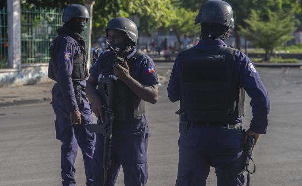 Armed forces secure the area where Haiti's prime minister, Ariel Henry, placed a bouquet of flowers in front of a memorial to independence hero Jean-Jacques Dessalines in Port-au-Prince, Haiti, on Sunday. Haitian police are working with U.S. officials and Armed forces secure the area where Haiti's prime minister, Ariel Henry, placed a bouquet of flowers in front of a memorial to independence hero Jean-Jacques Dessalines in Port-au-Prince, Haiti, on Sunday. Haitian police are working with U.S. officials and