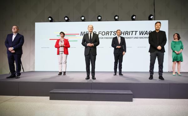 Members of three German parties at the signing of a coalition agreement are (from left) Social Democrats Norbert Walter-Borjan, Saskia Esken and new Chancellor Olaf Scholz, Free Democrat Christian Lindner, and the Green party's Robert Habeck and Annalena Members of three German parties at the signing of a coalition agreement are (from left) Social Democrats Norbert Walter-Borjan, Saskia Esken and new Chancellor Olaf Scholz, Free Democrat Christian Lindner, and the Green party's Robert Habeck and Annalena