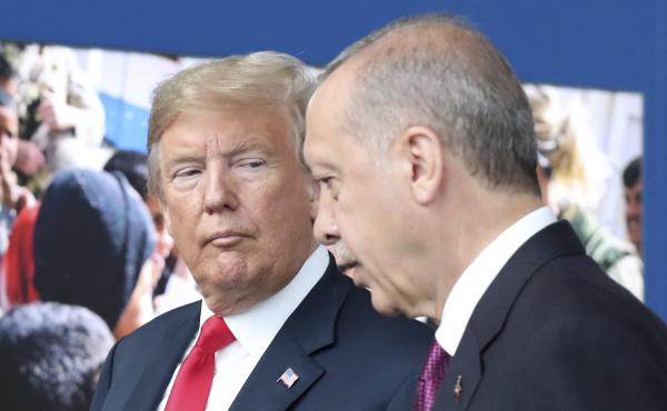 President Trump speaks with Turkish President Recep Tayyip Erdogan during a tour of the new NATO headquarters last month in Brussels, Belgium. Despite their alliance, the U.S. and Turkey have experienced escalating friction in recent weeks. President Trump speaks with Turkish President Recep Tayyip Erdogan during a tour of the new NATO headquarters last month in Brussels, Belgium. Despite their alliance, the U.S. and Turkey have experienced escalating friction in recent weeks.