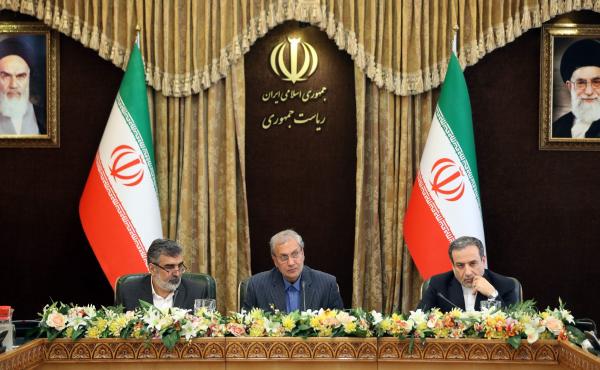 From left: Iran's Atomic Energy Organization spokesman Behrouz Kamalvandi, government spokesman Ali Rabiei and Deputy Foreign Minister Abbas Araghchi give a joint press conference at the presidential headquarters in the capital Tehran on Sunday. Iran is e From left: Iran's Atomic Energy Organization spokesman Behrouz Kamalvandi, government spokesman Ali Rabiei and Deputy Foreign Minister Abbas Araghchi give a joint press conference at the presidential headquarters in the capital Tehran on Sunday. Iran is e