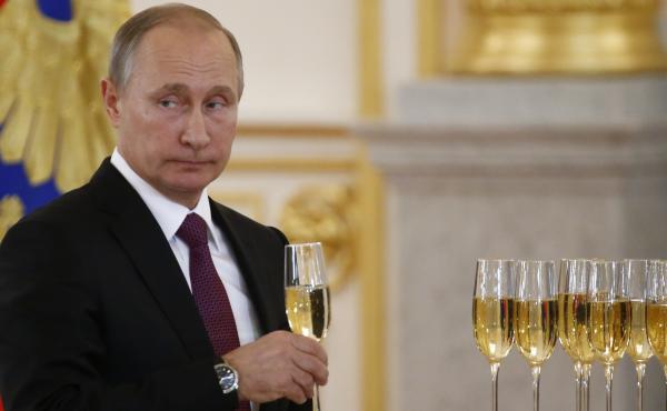 Russian President Putin holds a glass during a ceremony of receiving diplomatic credentials from foreign ambassadors in the Kremlin. President-elect Trump says he wants better relations with Putin. Russian President Putin holds a glass during a ceremony of receiving diplomatic credentials from foreign ambassadors in the Kremlin. President-elect Trump says he wants better relations with Putin.