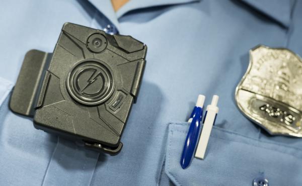 Body cameras, like this one shown at a 2014 press conference in Washington, D.C., are small enough to be clipped to an officer's chest. Washington and Denver are among U.S. cities trying the cameras. Body cameras, like this one shown at a 2014 press conference in Washington, D.C., are small enough to be clipped to an officer's chest. Washington and Denver are among U.S. cities trying the cameras.