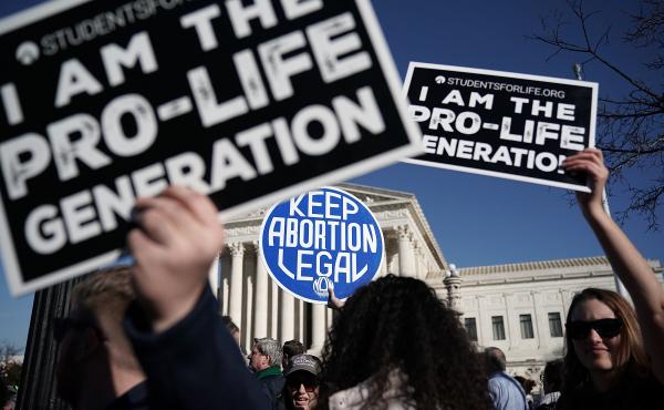 Demonstrators in favor of and against abortion rights made their beliefs known during a January 2018 protest in Washington, D.C. Demonstrators in favor of and against abortion rights made their beliefs known during a January 2018 protest in Washington, D.C.
