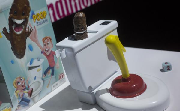 G.I. Woe: Mattel's Flushin' Frenzy sends a brown plastic poop flying into the air. It's pictured above at Toy Fair in New York in February 2018. G.I. Woe: Mattel's Flushin' Frenzy sends a brown plastic poop flying into the air. It's pictured above at Toy Fair in New York in February 2018.