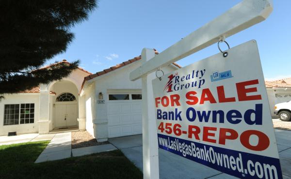 A house under foreclosure in Las Vegas displays a sign on Oct. 15, 2010, saying that it's now bank-owned. Sen. Sherrod Brown has vowed increased scrutiny of Wall Street banks, in part after a surge in foreclosures in his hometown in Ohio over a decade ago A house under foreclosure in Las Vegas displays a sign on Oct. 15, 2010, saying that it's now bank-owned. Sen. Sherrod Brown has vowed increased scrutiny of Wall Street banks, in part after a surge in foreclosures in his hometown in Ohio over a decade ago