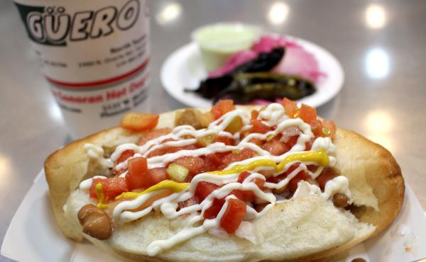 Earlier this year, the James Beard Foundation named El Güero Canelo an America's Classic, the organization's version of a Hall of Fame award for restaurants. The eatery is most famous for its Sonoran hot dogs, wrapped in bacon, covered in Mexican cream a Earlier this year, the James Beard Foundation named El Güero Canelo an America's Classic, the organization's version of a Hall of Fame award for restaurants. The eatery is most famous for its Sonoran hot dogs, wrapped in bacon, covered in Mexican cream a