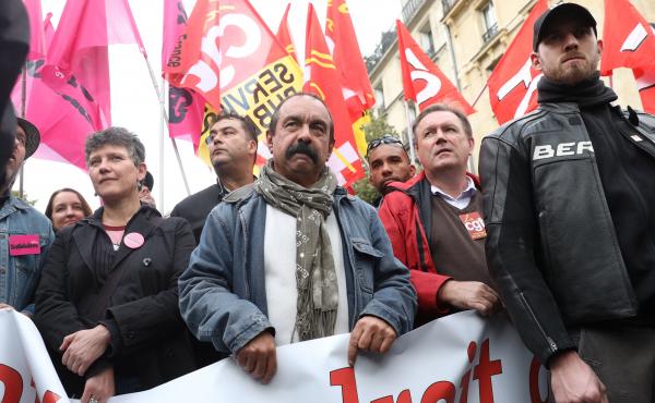 Demonstrators including French trade union leader Philippe Martinez, center, protest against President Emmanuel Macron's fast-tracked labor law reforms on Sept. 12 in Paris. Demonstrators including French trade union leader Philippe Martinez, center, protest against President Emmanuel Macron's fast-tracked labor law reforms on Sept. 12 in Paris.
