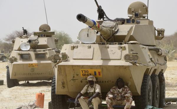 Chadian soldiers rest in the shade of their armored vehicle near Malam Fatori in April 2015, after troops retook the town from Boko Haram. Chadian soldiers rest in the shade of their armored vehicle near Malam Fatori in April 2015, after troops retook the town from Boko Haram.