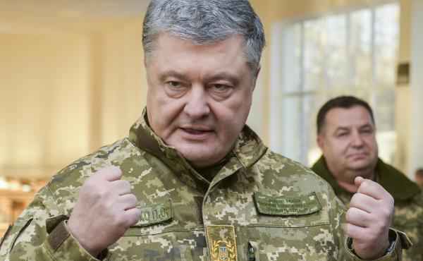 Ukrainian President Petro Poroshenko speaks to soldiers during a visit to a military base in Chernihiv region, Ukraine, on Wednesday. Russia and Ukraine traded blame after Russian border guards on Sunday opened fire on three Ukrainian navy vessels and eve Ukrainian President Petro Poroshenko speaks to soldiers during a visit to a military base in Chernihiv region, Ukraine, on Wednesday. Russia and Ukraine traded blame after Russian border guards on Sunday opened fire on three Ukrainian navy vessels and eve