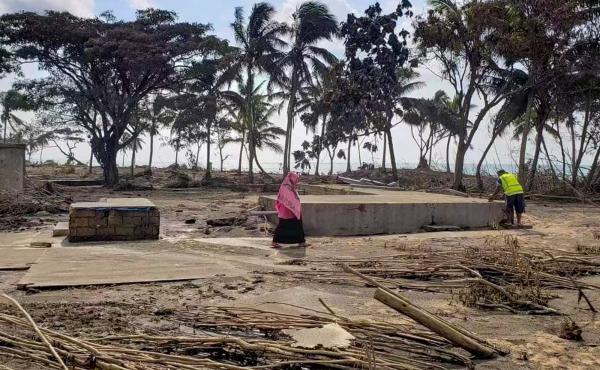 In this photo taken on Jan. 20, a beach resort in Tonga, on the outskirts of the capital of Nuku'alofa, shows the impact of the tsunami that hit the island nation in the wake of an underwater volcanic eruption. Aid efforts have been complicated by the pan In this photo taken on Jan. 20, a beach resort in Tonga, on the outskirts of the capital of Nuku'alofa, shows the impact of the tsunami that hit the island nation in the wake of an underwater volcanic eruption. Aid efforts have been complicated by the pan