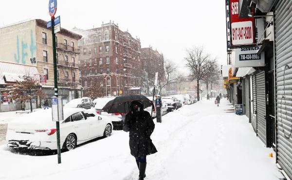 A massive winter storm is bringing heavy snowfall and strong winds to neighborhoods across the Northeast, like this one in Brooklyn, New York. A massive winter storm is bringing heavy snowfall and strong winds to neighborhoods across the Northeast, like this one in Brooklyn, New York.