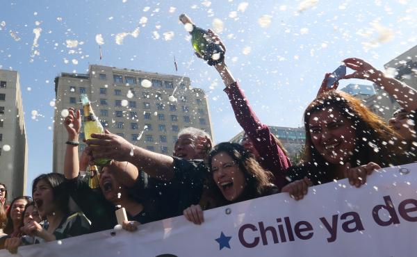 Activists celebrate outside the Constitutional Court in Santiago, Chile, on Monday. The court approved a measure to ease the country's strict abortion ban by decriminalizing the procedure in certain cases. Activists celebrate outside the Constitutional Court in Santiago, Chile, on Monday. The court approved a measure to ease the country's strict abortion ban by decriminalizing the procedure in certain cases.