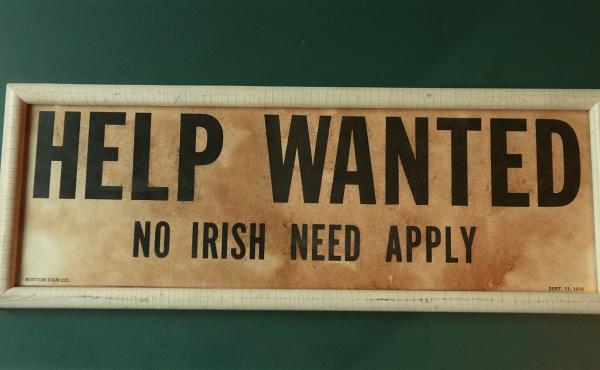 A now-closed Irish pub in Lawrence, Mass., displayed an old "Help Wanted/No Irish Need Apply" — a common sight across the country in the mid-1800s. A now-closed Irish pub in Lawrence, Mass., displayed an old "Help Wanted/No Irish Need Apply" — a common sight across the country in the mid-1800s.