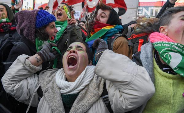Abortion rights activists celebrate Thurdsay outside the Argentine Congress in Buenos Aires, shortly after lawmakers in the country's lower chamber passed a bill legalizing abortion. The bill's chances look uncertain in the upper chamber, but that did lit Abortion rights activists celebrate Thurdsay outside the Argentine Congress in Buenos Aires, shortly after lawmakers in the country's lower chamber passed a bill legalizing abortion. The bill's chances look uncertain in the upper chamber, but that did lit