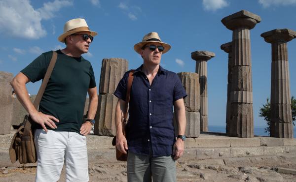 Actor-comedians Steve Coogan (left) and Rob Brydon (right) play coyly fictionalized versions of themselves in The Trip to Greece. Actor-comedians Steve Coogan (left) and Rob Brydon (right) play coyly fictionalized versions of themselves in The Trip to Greece.