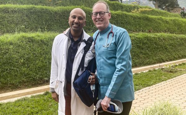 Dr. Paul Farmer (right) and Dr. Sriram Shamasunder on the Butaro hospital campus in Rwanda on Feb. 17. Farmer died on Feb. 21. Dr. Paul Farmer (right) and Dr. Sriram Shamasunder on the Butaro hospital campus in Rwanda on Feb. 17. Farmer died on Feb. 21.