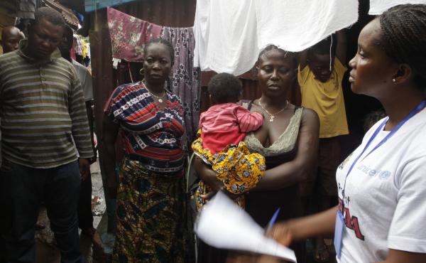 During the three-day lockdown, the government of Sierra Leone is sending teams of workers door-to-door to talk to people about how to protect themselves from Ebola. During the three-day lockdown, the government of Sierra Leone is sending teams of workers door-to-door to talk to people about how to protect themselves from Ebola.