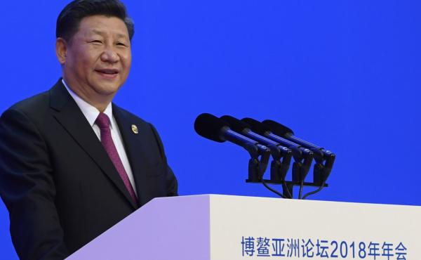 In this photo released by Xinhua News Agency, Chinese President Xi Jinping delivers his opening speech at the Boao Forum for Asia Annual Conference in Boao in south China's Hainan province, on Tuesday. In this photo released by Xinhua News Agency, Chinese President Xi Jinping delivers his opening speech at the Boao Forum for Asia Annual Conference in Boao in south China's Hainan province, on Tuesday.