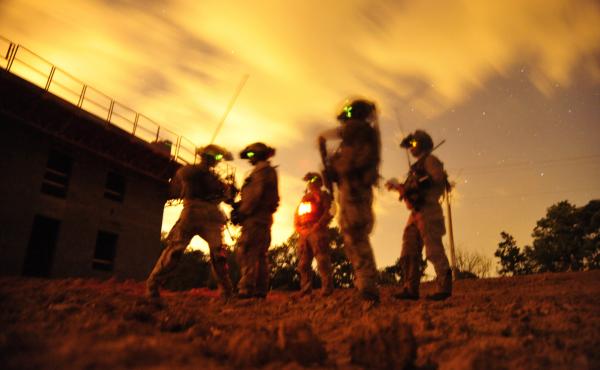Navy SEALs participate in special operations urban combat training in 2012. The training exercise familiarizes special operators with urban environments and tactical maneuvering during night and day operations. Navy SEALs participate in special operations urban combat training in 2012. The training exercise familiarizes special operators with urban environments and tactical maneuvering during night and day operations.