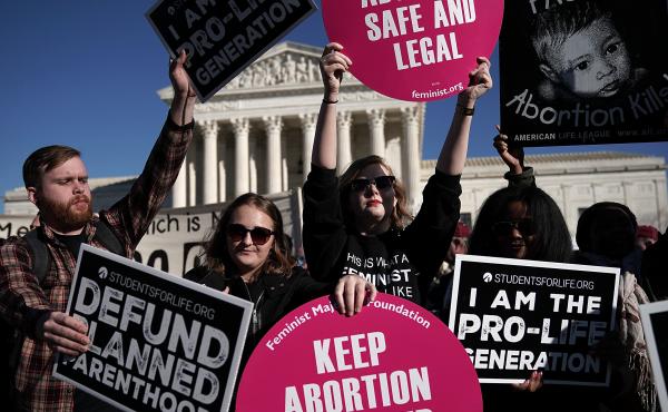 Activists both supporting and opposing abortion rights gathered in front of the the Supreme Court during the March for Life on Jan. 19. Activists both supporting and opposing abortion rights gathered in front of the the Supreme Court during the March for Life on Jan. 19.