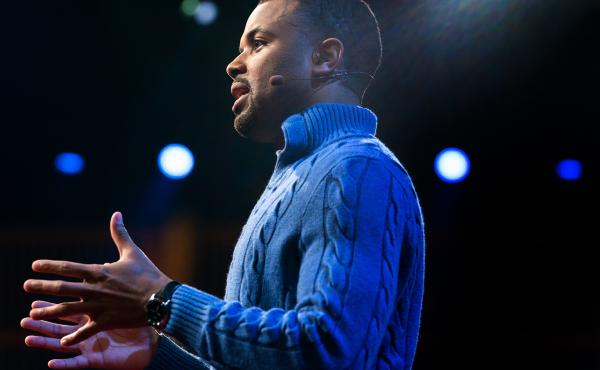 Zach Wood on the TED stage. Zach Wood on the TED stage.