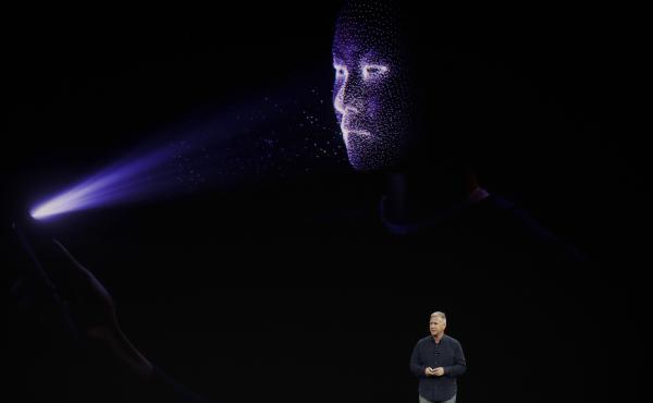 Phil Schiller, Apple's senior vice president of worldwide marketing, announces features of the new iPhone X on Sept. 12 at the Steve Jobs Theater on the new Apple campus in Cupertino, Calif. The phone's new ability to unlock itself using a scan of its own Phil Schiller, Apple's senior vice president of worldwide marketing, announces features of the new iPhone X on Sept. 12 at the Steve Jobs Theater on the new Apple campus in Cupertino, Calif. The phone's new ability to unlock itself using a scan of its own