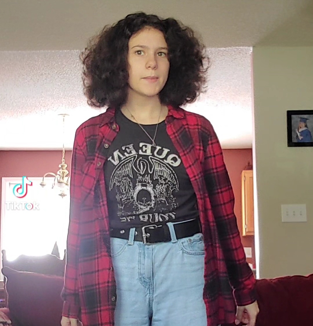 The story subject with big poofy hair